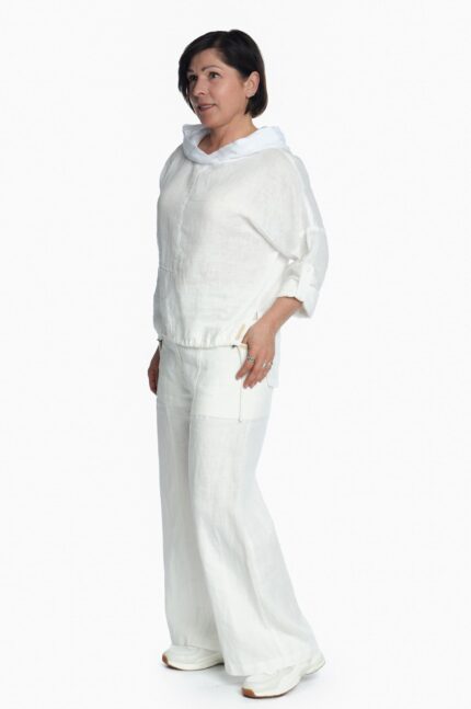 moteriškos laisvo stiliaus baltos, lininės kelnės
