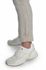 Šviesios siaurėjančios lininės moteriškos kelnės, su atlankais apačioje