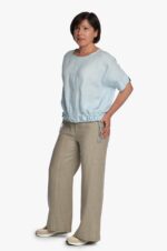 Natūralios spalvos lininės platėjančios moteriškos kelnės