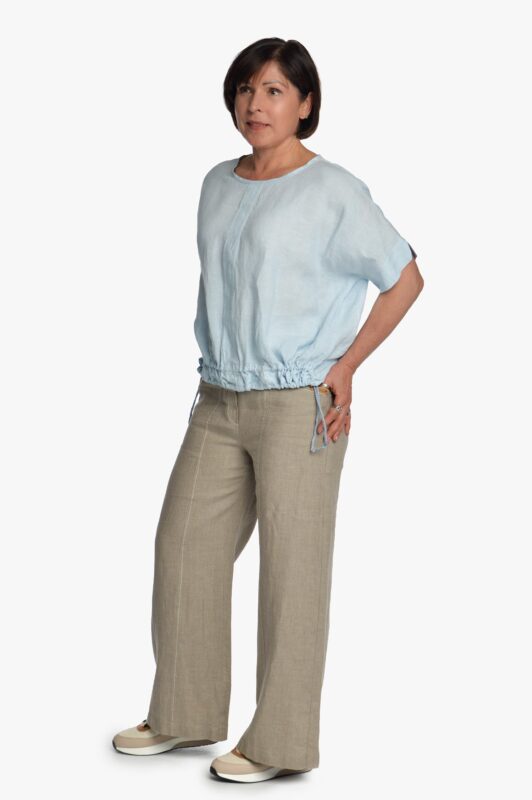 Natūralios spalvos lininės platėjančios moteriškos kelnės