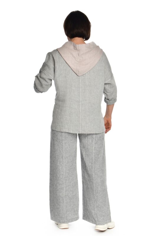 Pilkos į apačią platėjančios moteriškos lininės kelnės iš nugaros