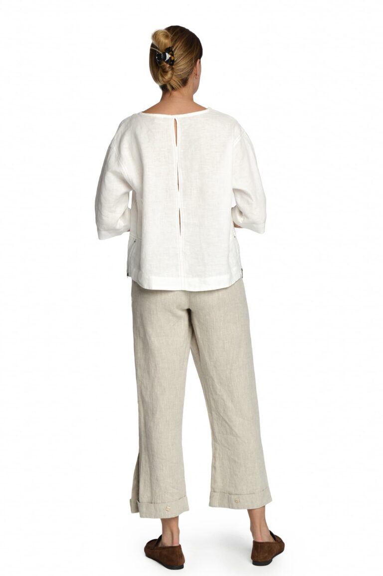 Šviesios lininės kelnės su skeltukais kelnių apačioje