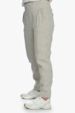 Šviesios moteriškos lininės kelnės siaurėjančios